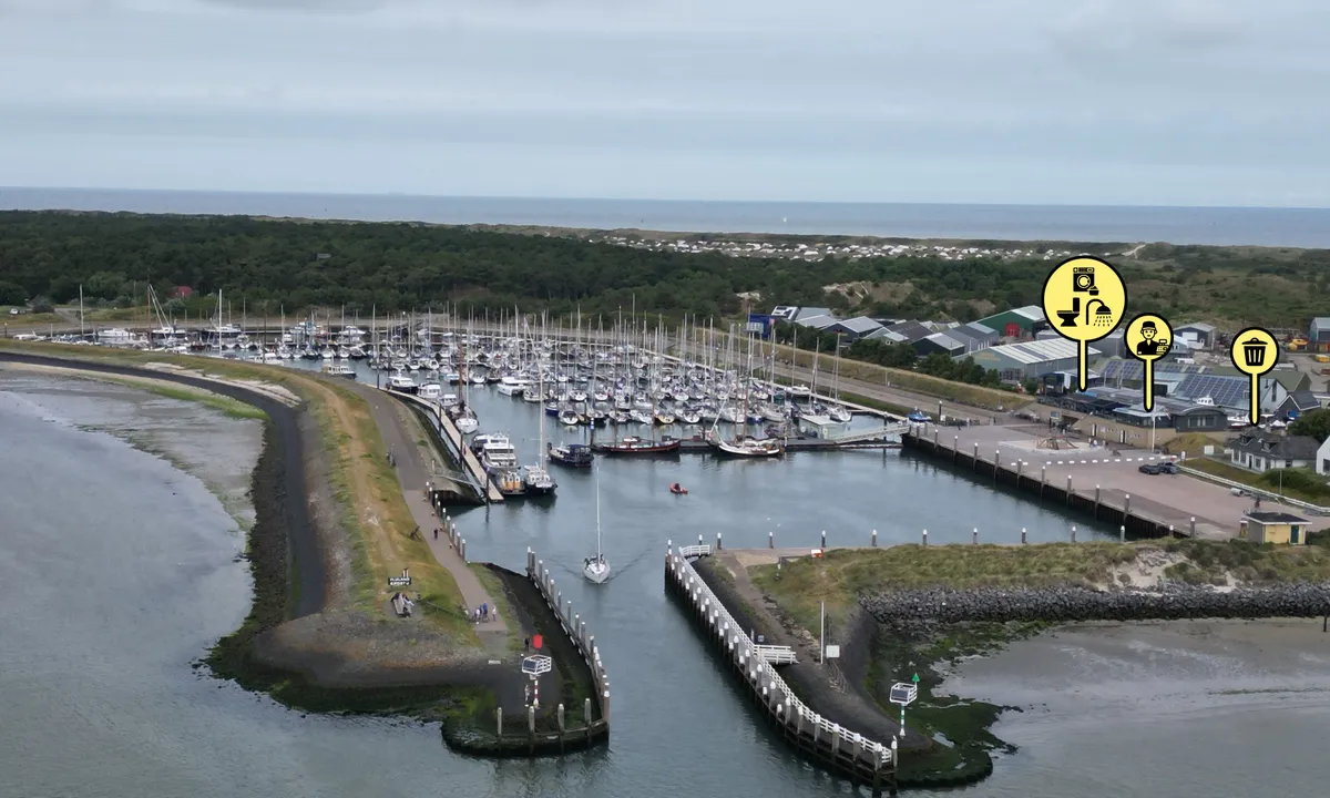 Vlieland Yachtharbor: {"base": "no", "no": "Innseilingen.  St\u00f8rre b\u00e5ter ligger i det f\u00f8rste havnebassenget", "se": "Inseglingen. St\u00f6rre b\u00e5tar ligger i den f\u00f6rsta hamnbass\u00e4ngen", "en": "The Approach. Larger boats lie in the first harbor basin.", "da": "Indsejlingen. St\u00f8rre b\u00e5de ligger i det f\u00f8rste havnebassin", "fr": "L'entr\u00e9e. Les grands bateaux se trouvent dans le premier bassin portuaire", "de": "Die Einfahrt. Gr\u00f6\u00dfere Boote liegen im ersten Hafenbecken", "es": "La entrada al puerto. Los barcos m\u00e1s grandes se encuentran en el primer muelle del puerto", "it": "L'ingresso. Le barche pi\u00f9 grandi si trovano nel primo bacino del porto", "pt": "A entrada. Barcos maiores ficam na primeira bacia portu\u00e1ria", "nl": "Invaart. Grotere boten liggen in het eerste havenbassin", "pl": "Wej\u015bcie. Wi\u0119ksze statki znajduj\u0105 si\u0119 w pierwszym basenie portowym", "uk": "\u041f\u0440\u043e\u0445\u0456\u0434 \u0443 \u0433\u0430\u0432\u0430\u043d\u044c. \u0412\u0435\u043b\u0438\u043a\u0456 \u0447\u043e\u0432\u043d\u0438 \u0440\u043e\u0437\u043c\u0456\u0449\u0443\u044e\u0442\u044c\u0441\u044f \u0432 \u043f\u0435\u0440\u0448\u043e\u043c\u0443 \u0433\u0430\u0432\u0430\u043d\u0441\u044c\u043a\u043e\u043c\u0443 \u0431\u0430\u0441\u0435\u0439\u043d\u0456", "ro": "Intrarea \u00een port. Navele mai mari sunt ancorate \u00een primul bazin al portului.", "tr": "Giri\u015f. Daha b\u00fcy\u00fck tekneler ilk liman havuzunda yer al\u0131r.", "el": "\u0397 \u03b5\u03af\u03c3\u03bf\u03b4\u03bf\u03c2. \u039c\u03b5\u03b3\u03b1\u03bb\u03cd\u03c4\u03b5\u03c1\u03b1 \u03c3\u03ba\u03ac\u03c6\u03b7 \u03b2\u03c1\u03af\u03c3\u03ba\u03bf\u03bd\u03c4\u03b1\u03b9 \u03c3\u03c4\u03b7\u03bd \u03c0\u03c1\u03ce\u03c4\u03b7 \u03bb\u03b5\u03ba\u03ac\u03bd\u03b7 \u03bb\u03b9\u03bc\u03ad\u03bd\u03b1", "cs": "P\u0159\u00edstupov\u00e1 cesta. V\u011bt\u0161\u00ed lod\u011b se nach\u00e1zej\u00ed v prvn\u00edm p\u0159\u00edstavn\u00edm baz\u00e9nu.", "hu": "Behaj\u00f3z\u00e1s. Nagyobb haj\u00f3k az els\u0151 kik\u00f6t\u0151medenc\u00e9ben tart\u00f3zkodnak", "fi": "L\u00e4hestyminen. Suuremmat veneet sijaitsevat ensimm\u00e4isess\u00e4 satama-altaassa", "bg": "\u0412\u043b\u0438\u0437\u0430\u043d\u0435 \u0432 \u043f\u0440\u0438\u0441\u0442\u0430\u043d\u0438\u0449\u0435\u0442\u043e. \u041f\u043e-\u0433\u043e\u043b\u0435\u043c\u0438\u0442\u0435 \u043a\u043e\u0440\u0430\u0431\u0438 \u043e\u0441\u0442\u0430\u0432\u0430\u0442 \u0432 \u043f\u044a\u0440\u0432\u0438\u044f \u0431\u0430\u0441\u0435\u0439\u043d \u043d\u0430 \u043f\u0440\u0438\u0441\u0442\u0430\u043d\u0438\u0449\u0435\u0442\u043e.", "sr": "\u0423\u043b\u0430\u0437 \u0443 \u043b\u0443\u043a\u0443. \u0412\u0435\u045b\u0438 \u0431\u0440\u043e\u0434\u043e\u0432\u0438 \u0441\u0435 \u043d\u0430\u043b\u0430\u0437\u0435 \u0443 \u043f\u0440\u0432\u043e\u043c \u043b\u0443\u0447\u043a\u043e\u043c \u0431\u0430\u0437\u0435\u043d\u0443", "et": "Sisses\u00f5it. Suuremad paadid asuvad esimeses sadamabasseinis", "lv": "Piebrauk\u0161ana. Liel\u0101kas laivas st\u0101v pirmaj\u0101 ostas basen\u0101", "lt": "\u012eplaukimas. Didesni laivai stovi pirmame uosto baseine"}